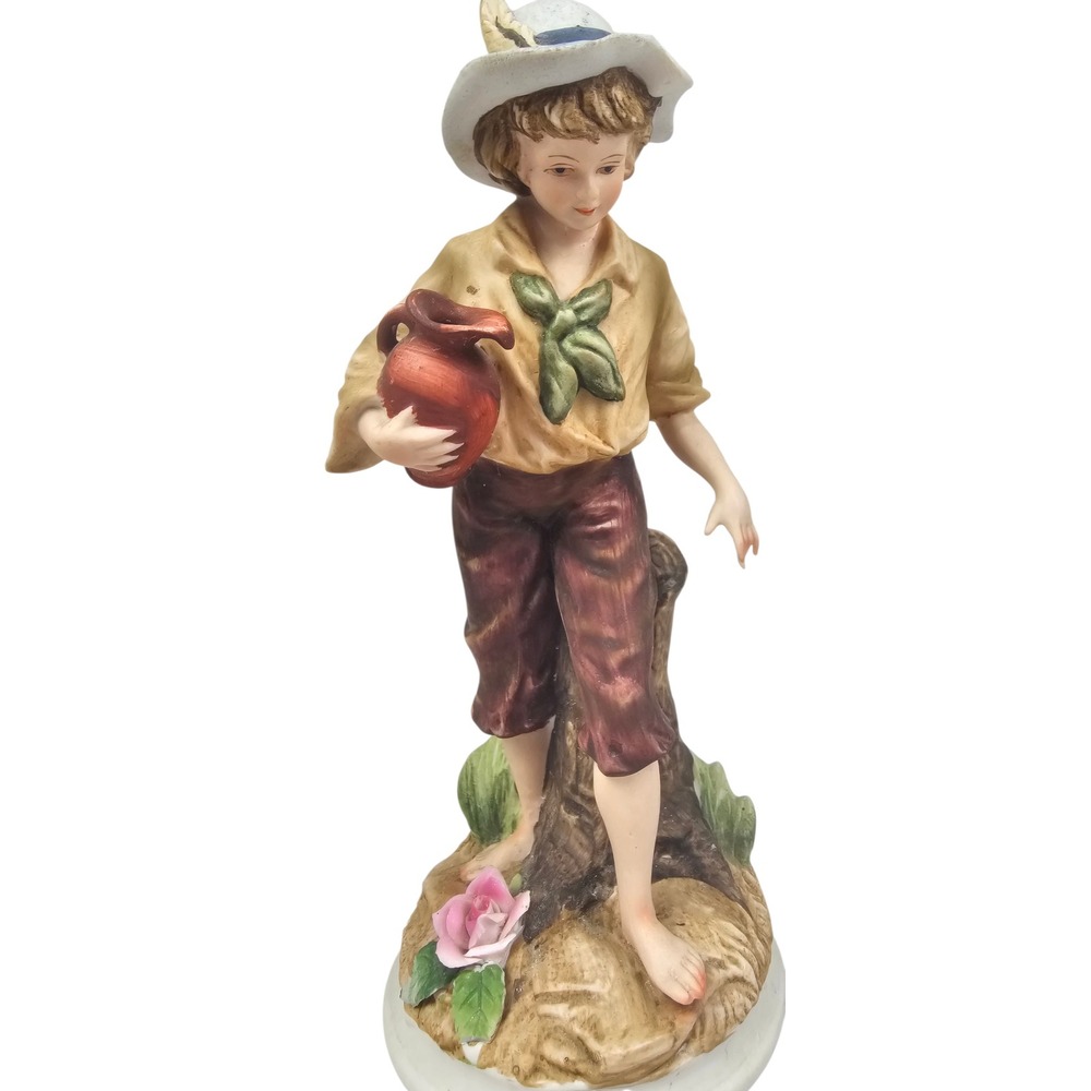 Andrea by Sadek Vintage Porcelain Boy Figurine with Water Jug and Feather Hat